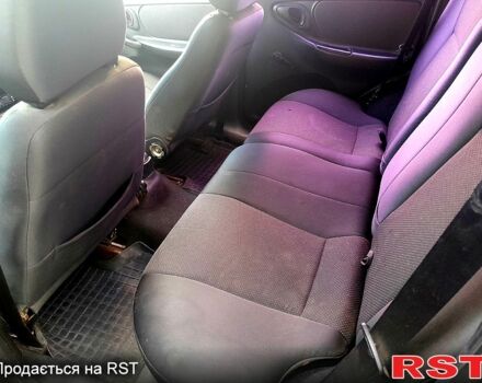 Черный Шевроле Нива, объемом двигателя 1.7 л и пробегом 160 тыс. км за 2999 $, фото 6 на Automoto.ua