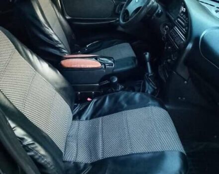 Черный Шевроле Нива, объемом двигателя 1.69 л и пробегом 180 тыс. км за 3300 $, фото 8 на Automoto.ua