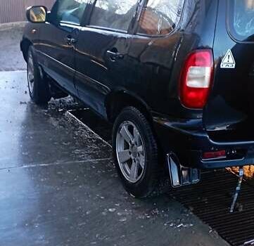 Черный Шевроле Нива, объемом двигателя 1.69 л и пробегом 189 тыс. км за 3500 $, фото 11 на Automoto.ua