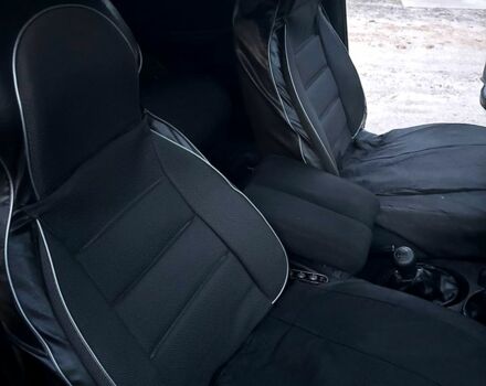 Черный Шевроле Нива, объемом двигателя 1.7 л и пробегом 194 тыс. км за 4100 $, фото 7 на Automoto.ua