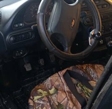 Черный Шевроле Нива, объемом двигателя 1.69 л и пробегом 189 тыс. км за 3500 $, фото 5 на Automoto.ua