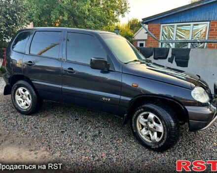 Черный Шевроле Нива, объемом двигателя 1.7 л и пробегом 194 тыс. км за 4100 $, фото 1 на Automoto.ua