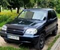Черный Шевроле Нива, объемом двигателя 1.7 л и пробегом 200 тыс. км за 3500 $, фото 1 на Automoto.ua