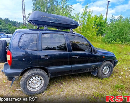 Черный Шевроле Нива, объемом двигателя 1.7 л и пробегом 127 тыс. км за 4400 $, фото 1 на Automoto.ua