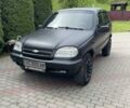 Черный Шевроле Нива, объемом двигателя 1.7 л и пробегом 103 тыс. км за 3500 $, фото 1 на Automoto.ua
