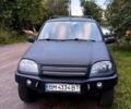 Черный Шевроле Нива, объемом двигателя 1.7 л и пробегом 180 тыс. км за 5000 $, фото 1 на Automoto.ua