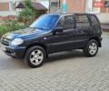 Черный Шевроле Нива, объемом двигателя 1.7 л и пробегом 175 тыс. км за 4200 $, фото 1 на Automoto.ua