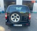 Черный Шевроле Нива, объемом двигателя 1.7 л и пробегом 250 тыс. км за 2300 $, фото 2 на Automoto.ua