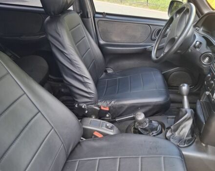 Черный Шевроле Нива, объемом двигателя 1.7 л и пробегом 36 тыс. км за 5900 $, фото 5 на Automoto.ua