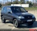 Черный Шевроле Нива, объемом двигателя 1.7 л и пробегом 200 тыс. км за 1800 $, фото 1 на Automoto.ua