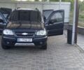 Черный Шевроле Нива, объемом двигателя 1.7 л и пробегом 111 тыс. км за 5700 $, фото 2 на Automoto.ua