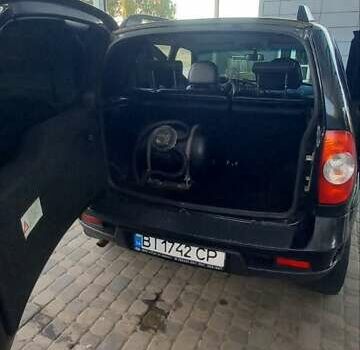 Черный Шевроле Нива, объемом двигателя 1.7 л и пробегом 111 тыс. км за 5700 $, фото 8 на Automoto.ua