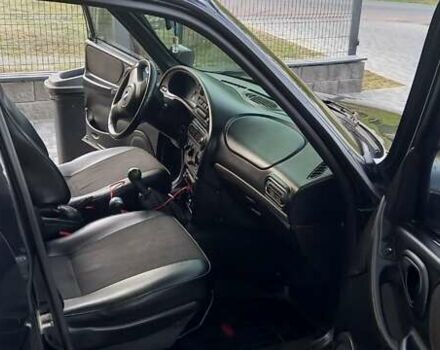 Черный Шевроле Нива, объемом двигателя 1.7 л и пробегом 111 тыс. км за 5700 $, фото 4 на Automoto.ua