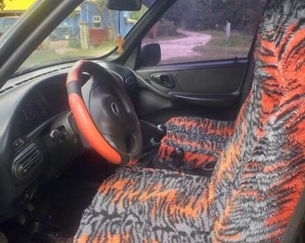 Черный Шевроле Нива, объемом двигателя 1.69 л и пробегом 148 тыс. км за 4950 $, фото 2 на Automoto.ua