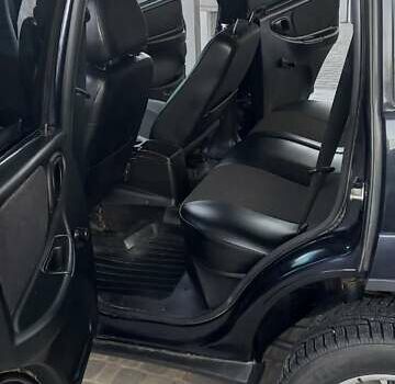 Черный Шевроле Нива, объемом двигателя 1.7 л и пробегом 111 тыс. км за 5700 $, фото 7 на Automoto.ua