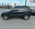 Черный Шевроле Нива, объемом двигателя 1.69 л и пробегом 118 тыс. км за 7500 $, фото 3 на Automoto.ua