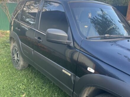 Черный Шевроле Нива, объемом двигателя 1.7 л и пробегом 125 тыс. км за 7000 $, фото 1 на Automoto.ua