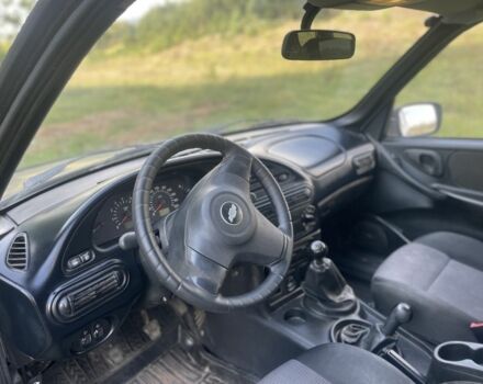 Коричневый Шевроле Нива, объемом двигателя 1.7 л и пробегом 250 тыс. км за 3500 $, фото 3 на Automoto.ua