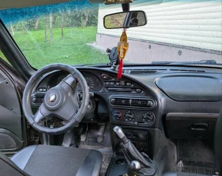 Коричневый Шевроле Нива, объемом двигателя 1.7 л и пробегом 170 тыс. км за 4800 $, фото 2 на Automoto.ua