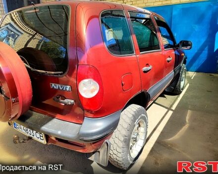 Красный Шевроле Нива, объемом двигателя 1.7 л и пробегом 135 тыс. км за 3300 $, фото 2 на Automoto.ua