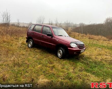Красный Шевроле Нива, объемом двигателя 1.7 л и пробегом 250 тыс. км за 3300 $, фото 2 на Automoto.ua