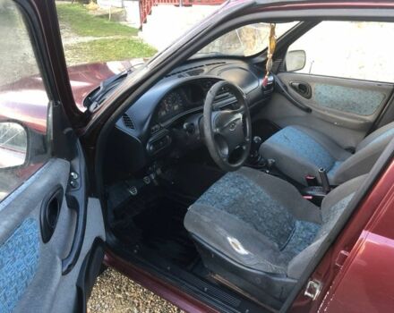 Красный Шевроле Нива, объемом двигателя 1.7 л и пробегом 280 тыс. км за 2350 $, фото 14 на Automoto.ua