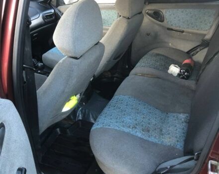 Красный Шевроле Нива, объемом двигателя 1.7 л и пробегом 280 тыс. км за 2350 $, фото 15 на Automoto.ua