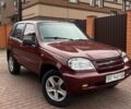Красный Шевроле Нива, объемом двигателя 1.7 л и пробегом 222 тыс. км за 2999 $, фото 1 на Automoto.ua