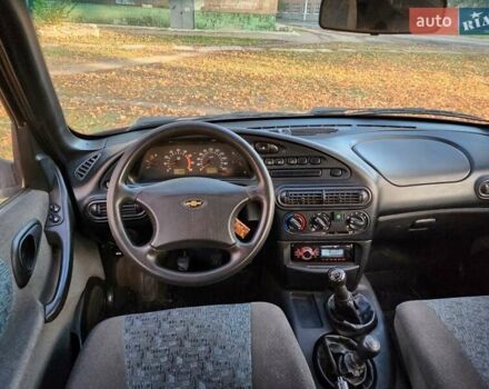 Червоний Шевроле Нива, об'ємом двигуна 1.7 л та пробігом 301 тис. км за 2950 $, фото 3 на Automoto.ua