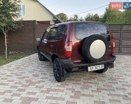 Червоний Шевроле Нива, об'ємом двигуна 1.7 л та пробігом 250 тис. км за 2950 $, фото 1 на Automoto.ua
