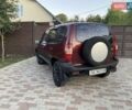 Червоний Шевроле Нива, об'ємом двигуна 1.7 л та пробігом 250 тис. км за 2950 $, фото 1 на Automoto.ua