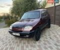 Червоний Шевроле Нива, об'ємом двигуна 1.7 л та пробігом 250 тис. км за 2950 $, фото 6 на Automoto.ua