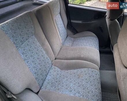 Червоний Шевроле Нива, об'ємом двигуна 1.7 л та пробігом 250 тис. км за 2950 $, фото 3 на Automoto.ua