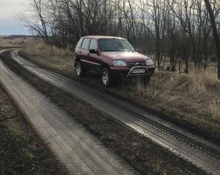 Красный Шевроле Нива, объемом двигателя 1.7 л и пробегом 180 тыс. км за 4800 $, фото 15 на Automoto.ua