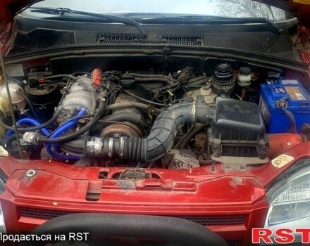 Красный Шевроле Нива, объемом двигателя 1.7 л и пробегом 217 тыс. км за 3900 $, фото 5 на Automoto.ua