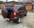 Червоний Шевроле Нива, об'ємом двигуна 1.69 л та пробігом 200 тис. км за 4450 $, фото 11 на Automoto.ua