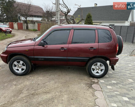 Червоний Шевроле Нива, об'ємом двигуна 1.69 л та пробігом 200 тис. км за 4450 $, фото 2 на Automoto.ua