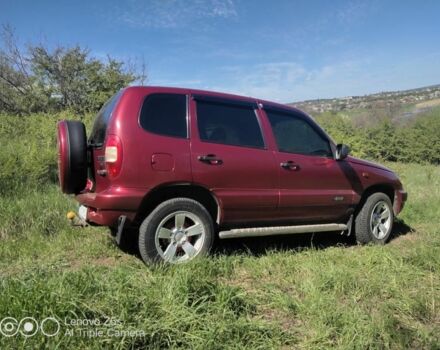 Красный Шевроле Нива, объемом двигателя 2 л и пробегом 109 тыс. км за 4400 $, фото 1 на Automoto.ua