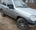 Серый Шевроле Нива, объемом двигателя 1.7 л и пробегом 193 тыс. км за 3200 $, фото 1 на Automoto.ua