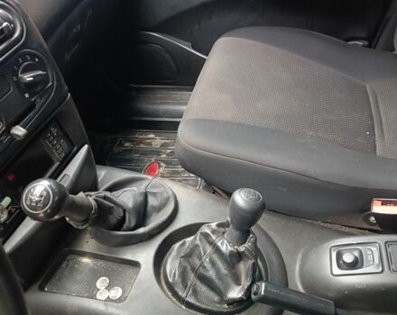 Серый Шевроле Нива, объемом двигателя 1.7 л и пробегом 193 тыс. км за 3200 $, фото 5 на Automoto.ua