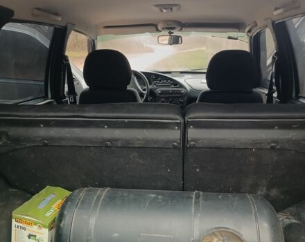 Серый Шевроле Нива, объемом двигателя 1.7 л и пробегом 193 тыс. км за 3200 $, фото 23 на Automoto.ua