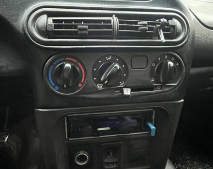 Серый Шевроле Нива, объемом двигателя 1.7 л и пробегом 276 тыс. км за 4000 $, фото 5 на Automoto.ua