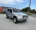 Серый Шевроле Нива, объемом двигателя 1.7 л и пробегом 206 тыс. км за 3400 $, фото 1 на Automoto.ua