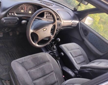 Серый Шевроле Нива, объемом двигателя 1.7 л и пробегом 169 тыс. км за 2700 $, фото 6 на Automoto.ua