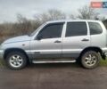 Серый Шевроле Нива, объемом двигателя 1.8 л и пробегом 205 тыс. км за 2841 $, фото 1 на Automoto.ua