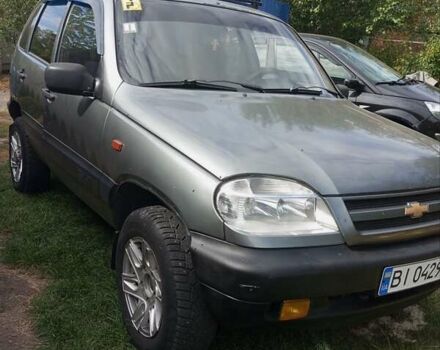 Серый Шевроле Нива, объемом двигателя 1.7 л и пробегом 218 тыс. км за 4150 $, фото 7 на Automoto.ua
