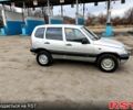 Серый Шевроле Нива, объемом двигателя 1.7 л и пробегом 167 тыс. км за 3200 $, фото 1 на Automoto.ua