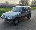 Серый Шевроле Нива, объемом двигателя 1.7 л и пробегом 169 тыс. км за 2700 $, фото 1 на Automoto.ua