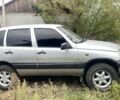 Серый Шевроле Нива, объемом двигателя 1.7 л и пробегом 220 тыс. км за 3000 $, фото 1 на Automoto.ua