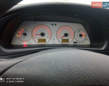 Серый Шевроле Нива, объемом двигателя 1.69 л и пробегом 239 тыс. км за 3650 $, фото 5 на Automoto.ua